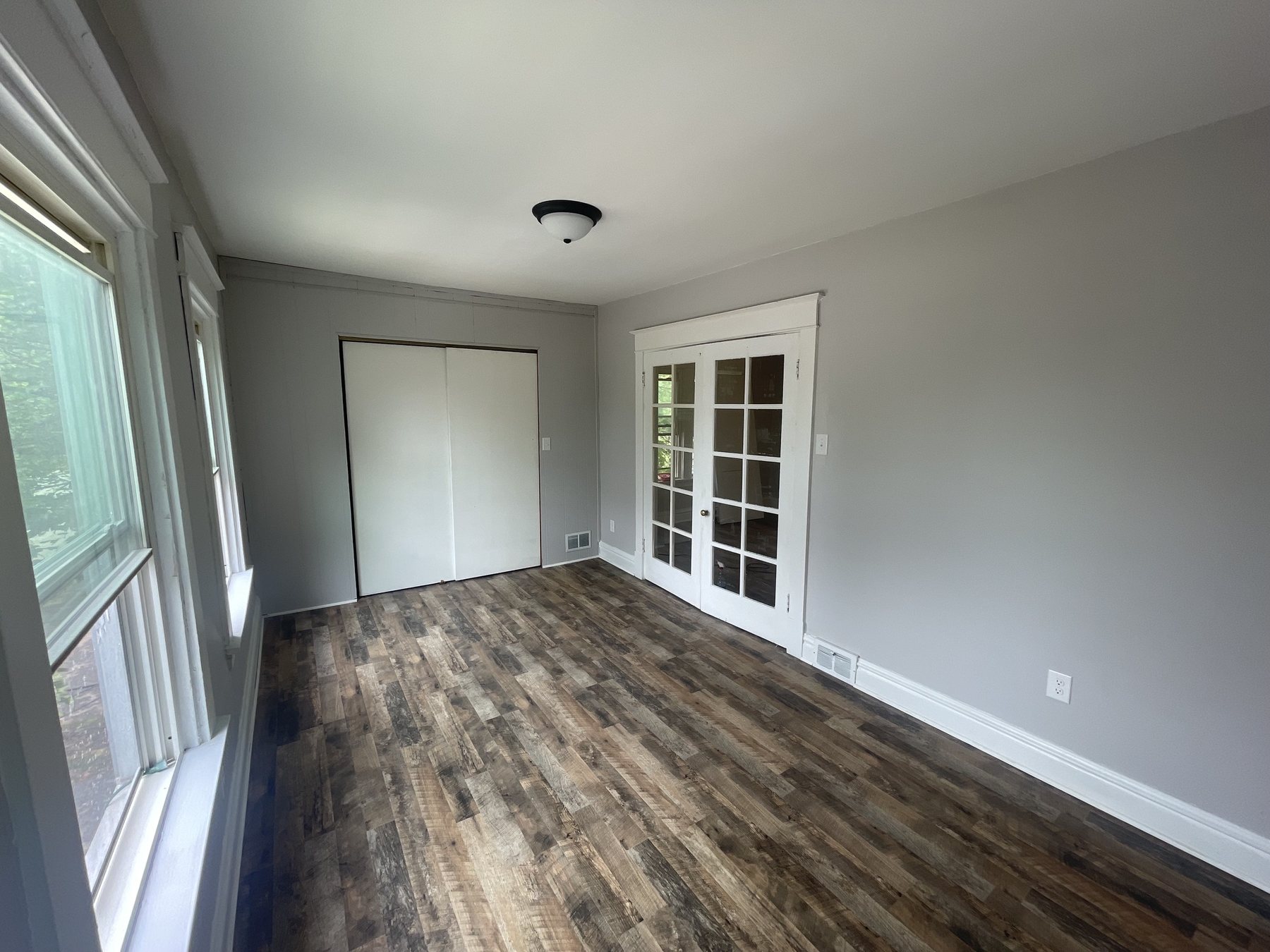Finished bedroom with French doors