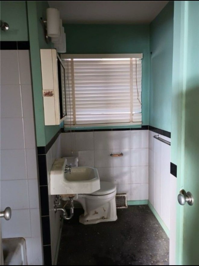 Original bathroom before the rental refresh